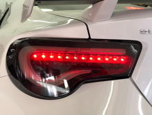 Picture of WSQ Valenti Style Smoked Sequential Taillights  w/ Black housing and White Bar